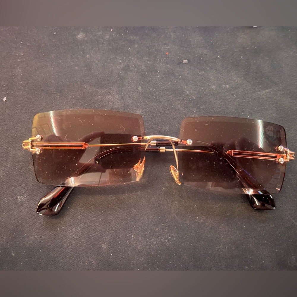 Men’s gold sunglasses